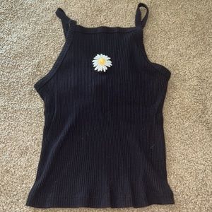 I am selling this cute summer tank top with an embroidered daisey.